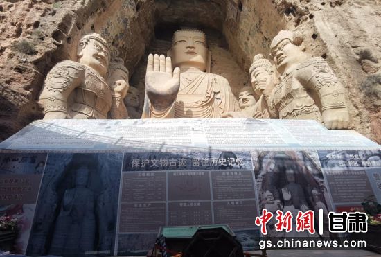 時下，中國“石窟鼻祖”天梯山石窟第13窟大佛足部與局部危巖體搶救性保護項目正在施工。圖為施工現(xiàn)場。陳曉斌 攝